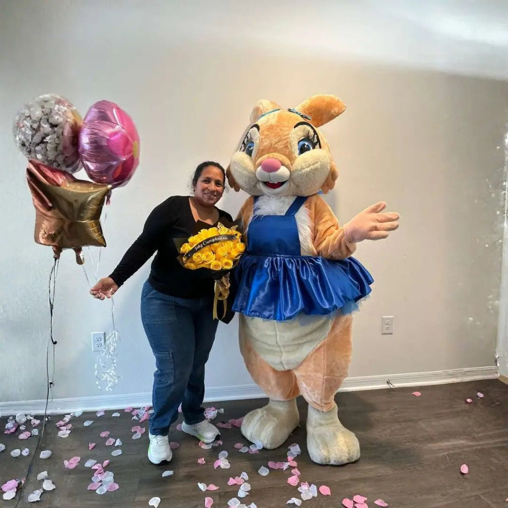 Loli the Bunny mascot with a happy customer holding yellow roses and balloons for an indoor surprise delivery in Miami.