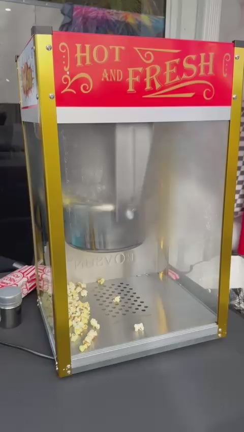 Video of a Fantasy Entertainments classic popcorn machine popping fresh hot popcorn at a Miami event.