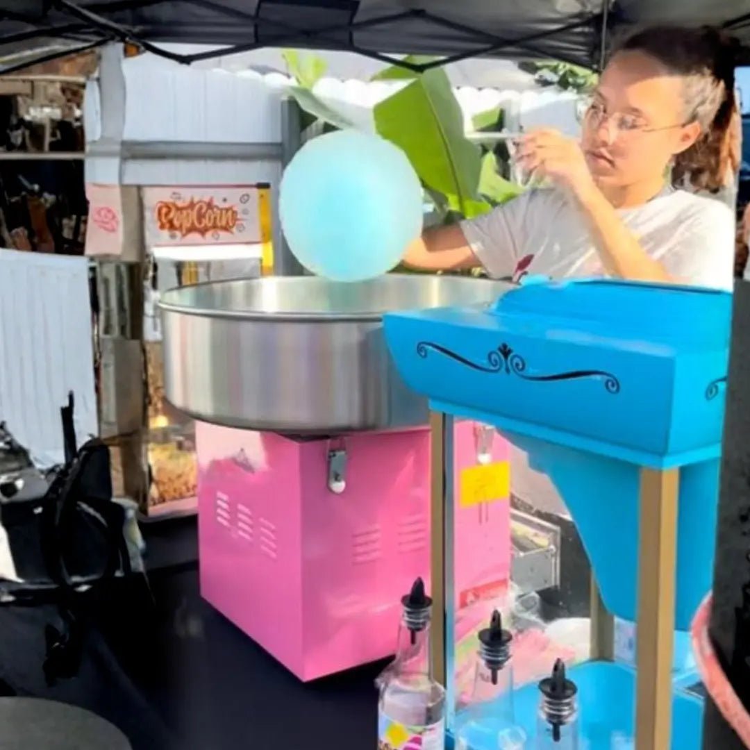 Cotton candy, popcorn and snow cone snack stations together at a Miami event, a full concession setup by Fantasy Entertainments.